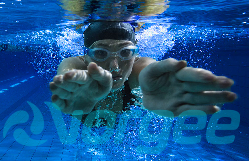 Swimmer in a pool with clear goggles